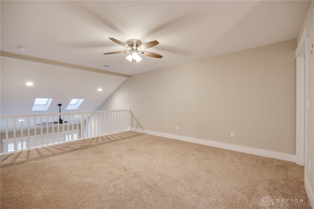 bonus room with carpet flooring, ceiling fan, and lofted ceiling