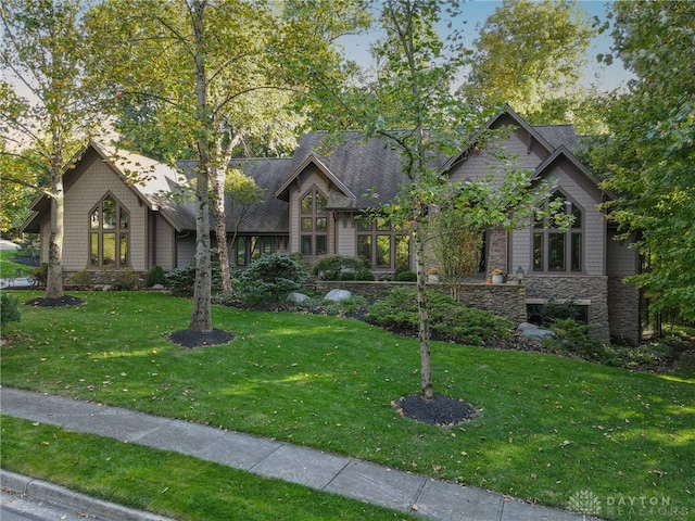 view of front of property with a front lawn