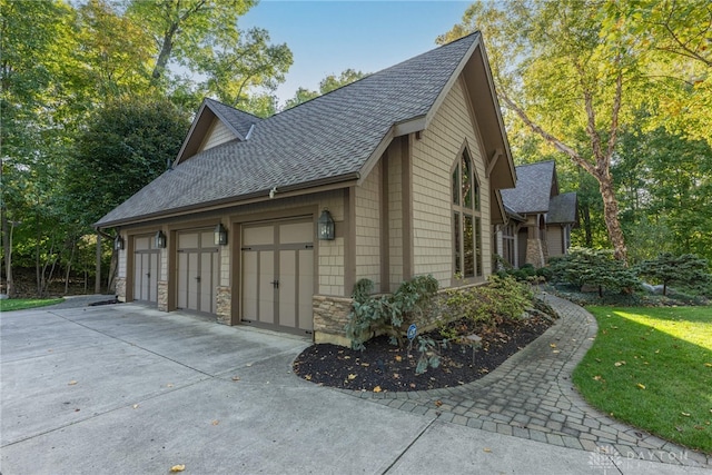 view of property exterior featuring a garage