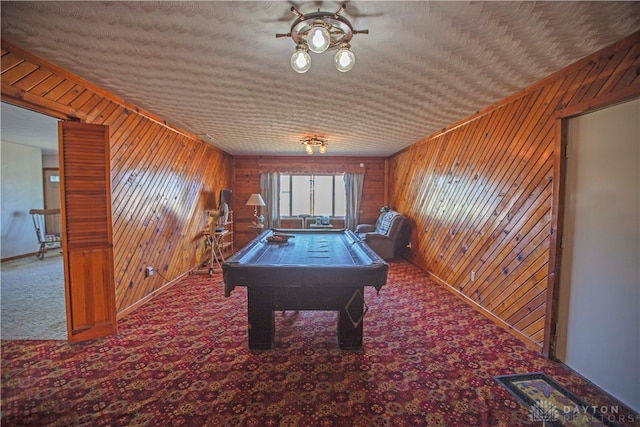 playroom with pool table, ceiling fan, wood walls, and carpet floors