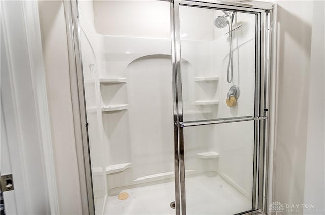 bathroom with an enclosed shower