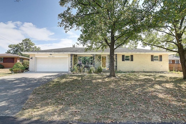 single story home with a garage