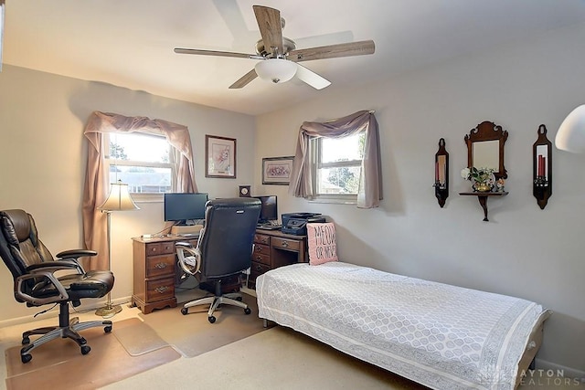 bedroom with carpet flooring and a ceiling fan