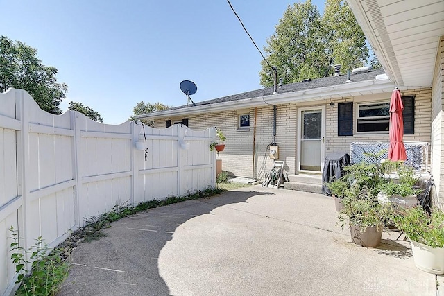 exterior space with entry steps and fence