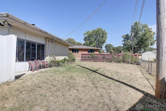 view of yard with fence