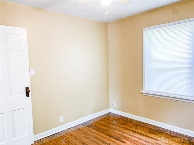 unfurnished room featuring hardwood / wood-style floors