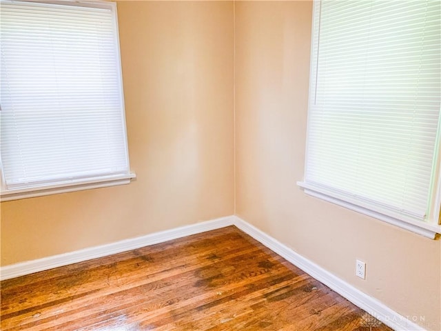 empty room featuring hardwood / wood-style floors