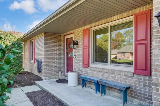 property entrance featuring a porch