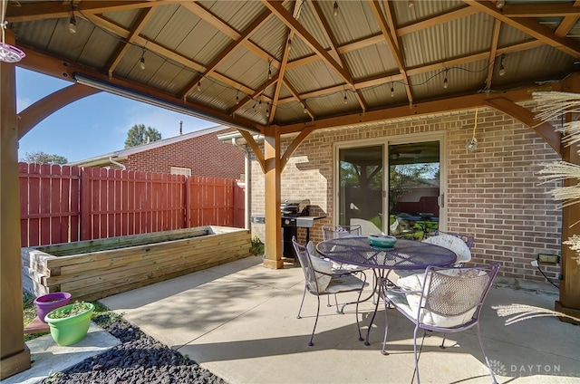 view of patio featuring a gazebo and area for grilling