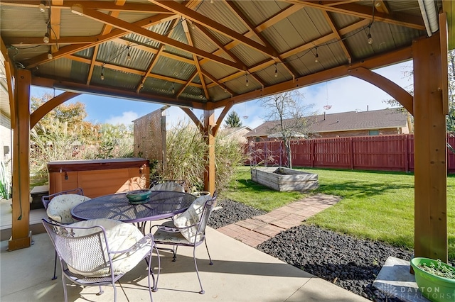 view of patio / terrace with a gazebo and a hot tub