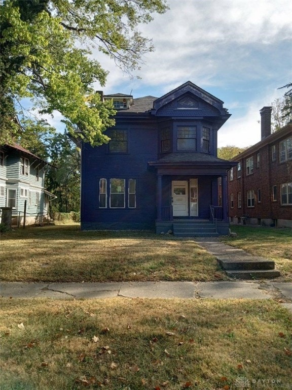 view of front of home with a front yard