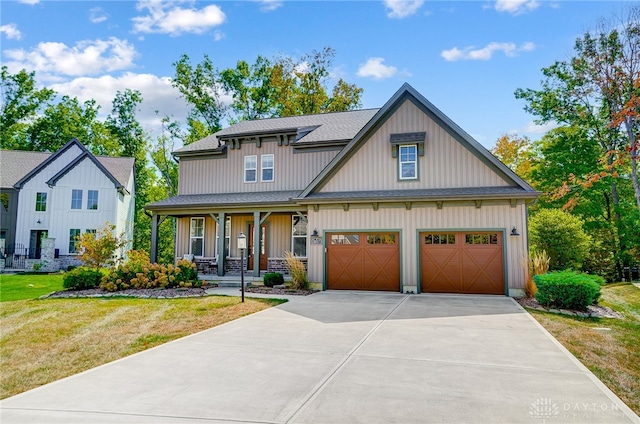 view of front of property with covered porch and a front yard