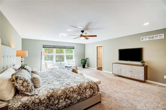 carpeted bedroom with ceiling fan