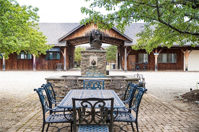 view of patio / terrace with a fireplace