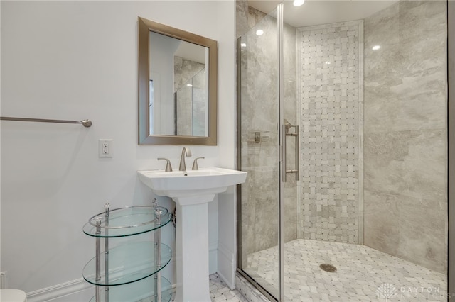 bathroom with walk in shower and toilet