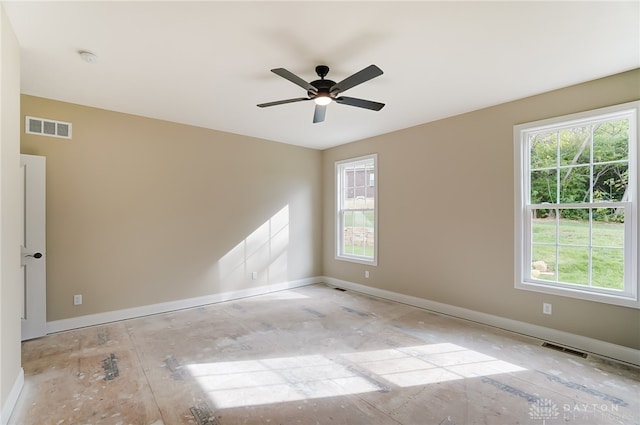 empty room featuring ceiling fan