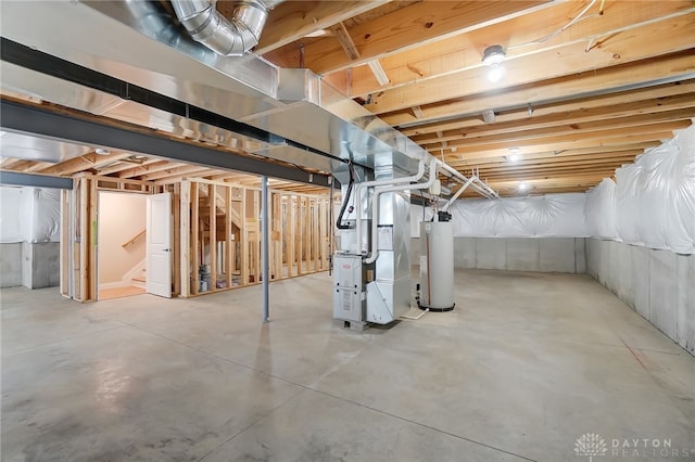 basement with heating unit and water heater