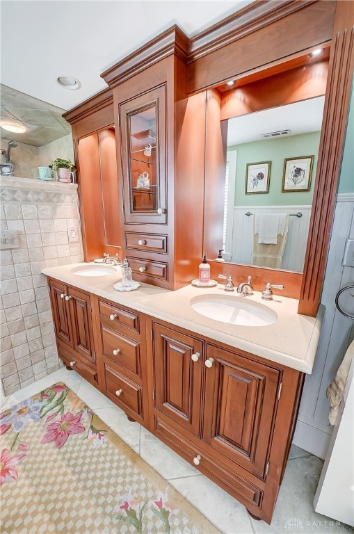 bathroom with vanity, tile walls, and tile patterned floors