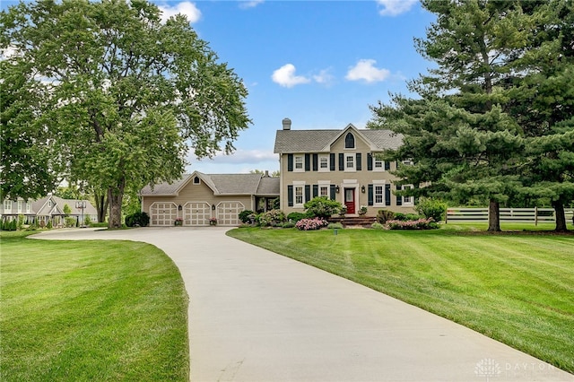 colonial-style house with a front lawn