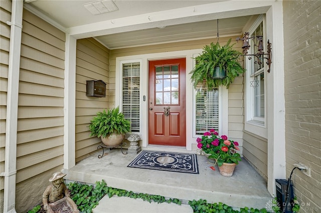 property entrance with a porch