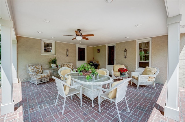 view of patio / terrace featuring ceiling fan