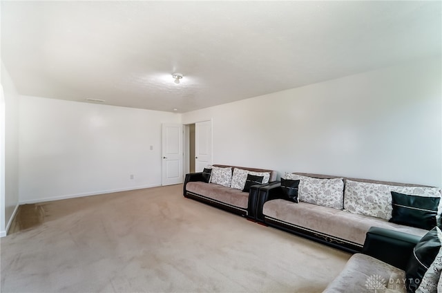 living room with light colored carpet