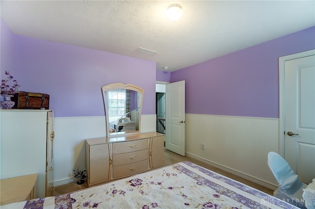 bedroom with a textured ceiling