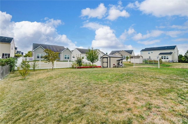 view of yard featuring a storage shed