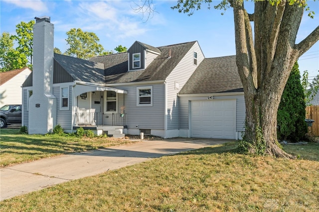 view of front facade with a porch, a garage, and a front yard