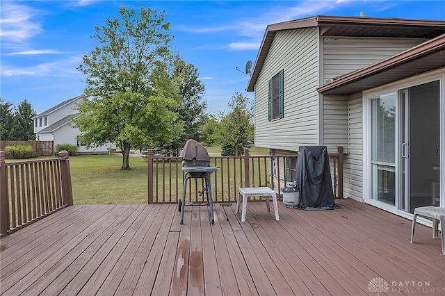 wooden deck with a yard