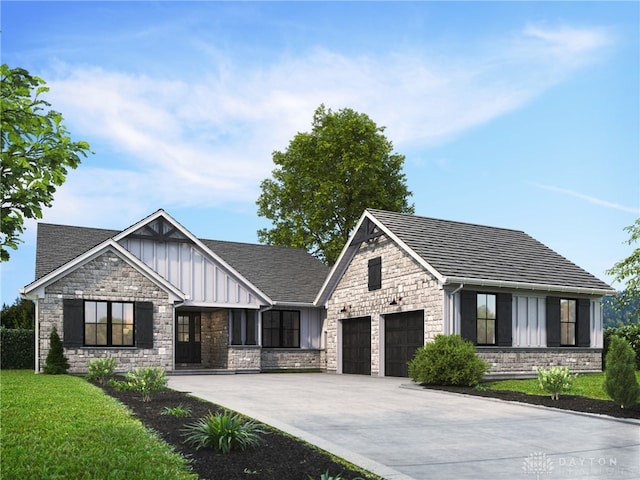 view of front facade with a garage and a front lawn