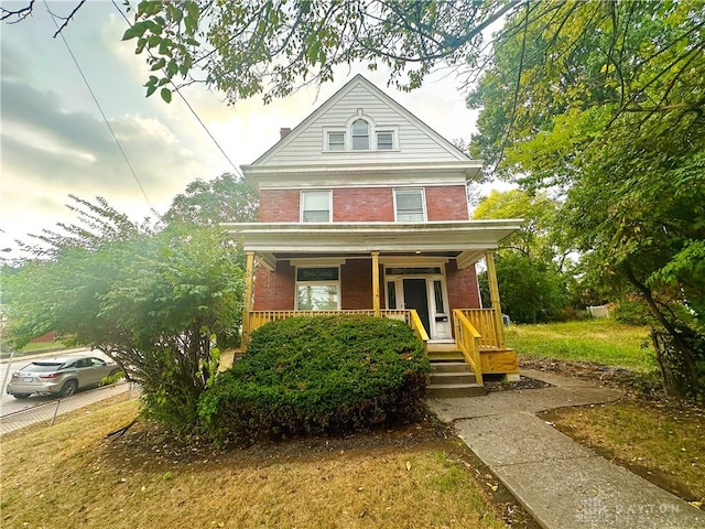 3501 Bevis Ave, Cincinnati, OH 45207 - traditional style home with brick siding and a porch