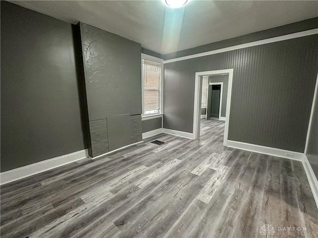 3501 Bevis Ave, Cincinnati, OH 45207 - empty room with baseboards and wood finished floors