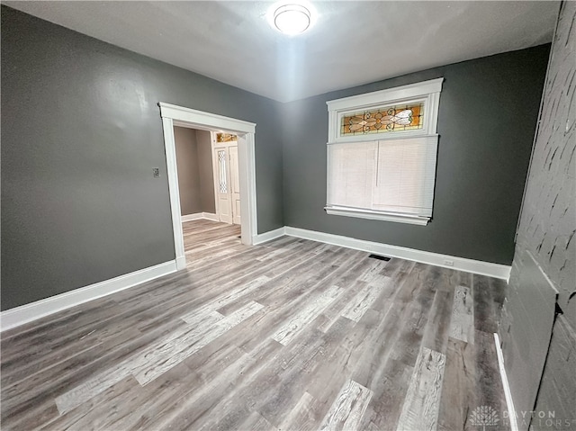 unfurnished bedroom featuring light hardwood / wood-style floors