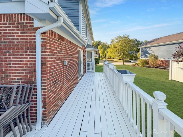 deck featuring a lawn