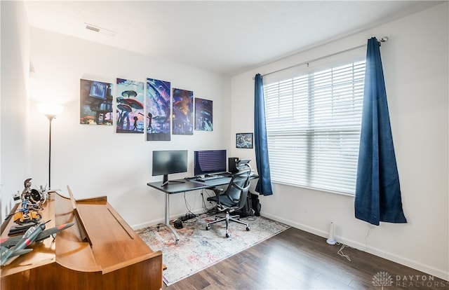 home office featuring dark wood-type flooring