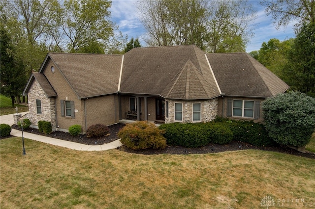 view of front of property with a front lawn