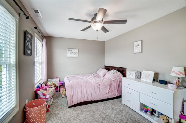 carpeted bedroom with ceiling fan