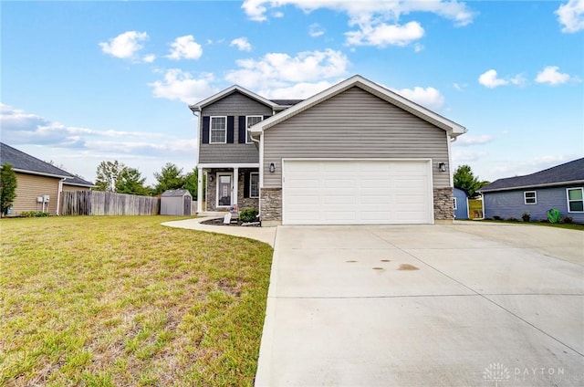 view of front of property with a garage and a front yard