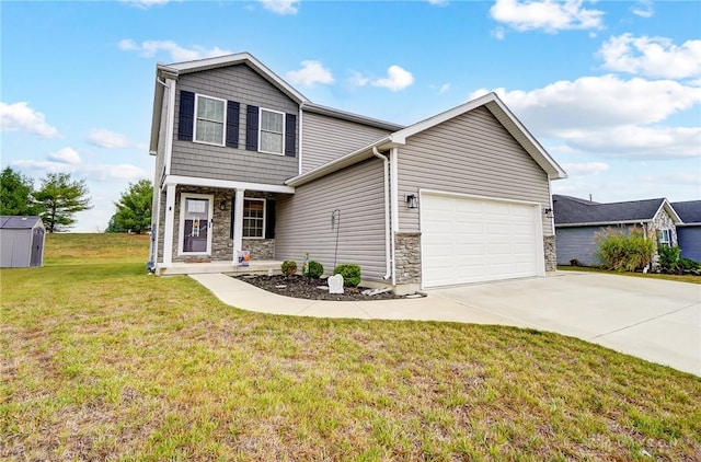 view of front of home featuring a front yard and a garage