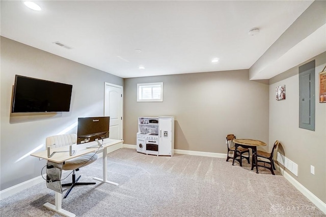 carpeted office space featuring electric panel