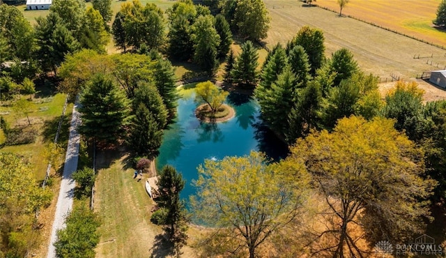 drone / aerial view featuring a water view and a rural view