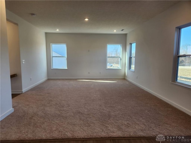 view of carpeted spare room