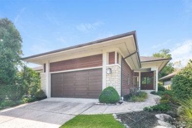 view of side of home with a garage