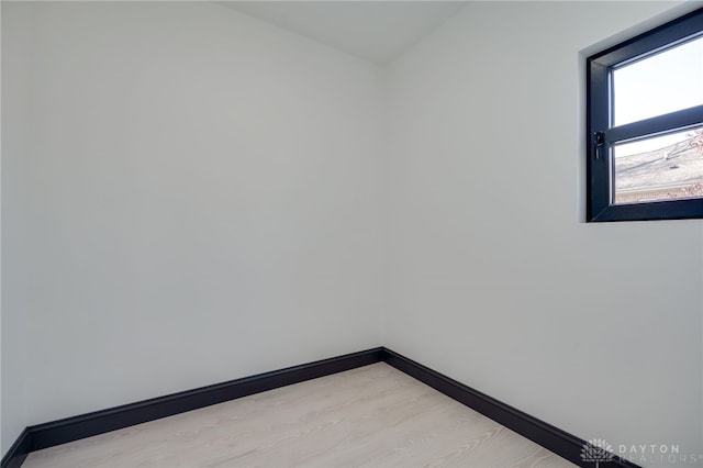 unfurnished room featuring light wood-type flooring