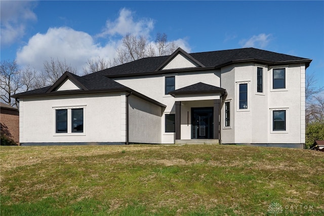 view of front facade with a front yard