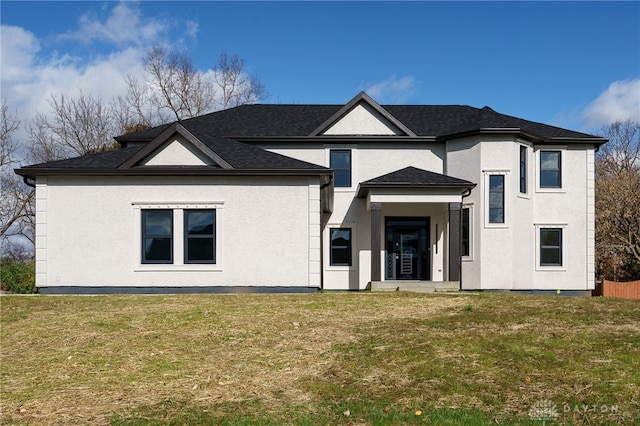 view of front of home with a front lawn