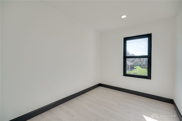 empty room with light wood-type flooring