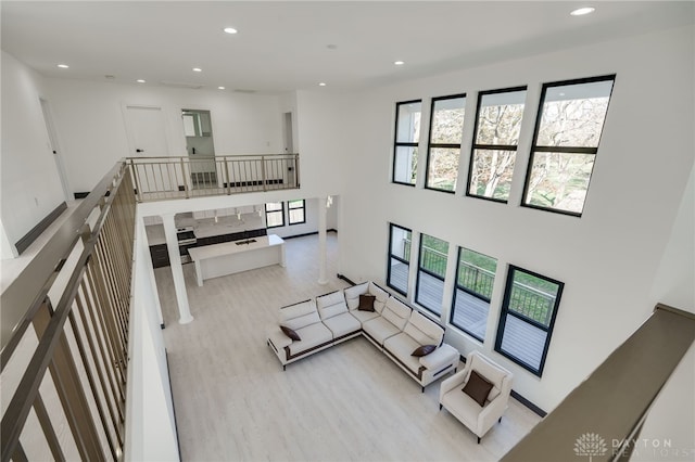 living room with light hardwood / wood-style floors