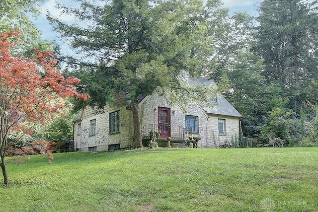 view of front of home with a front yard